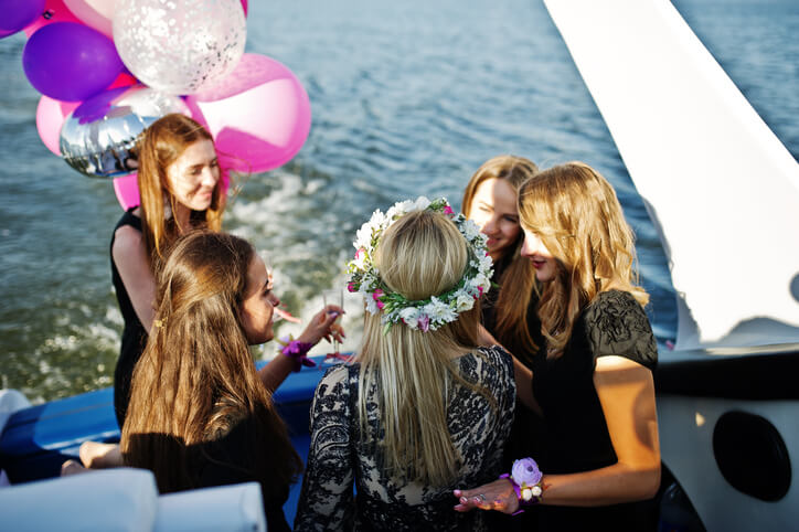 Five girls wear on black having fun at hen party